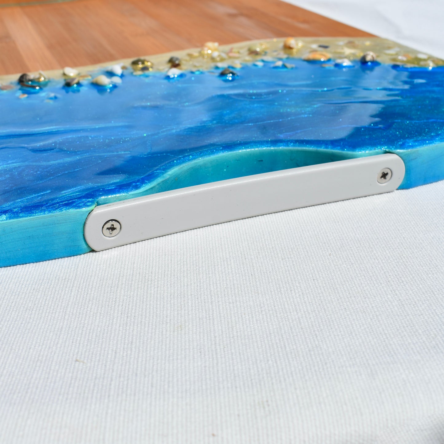 This charcuterie board has a handle to make it easy to carry.
